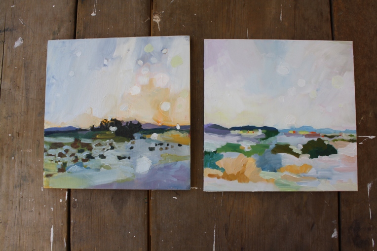 photo of two oil paintings landscapes of new mexico